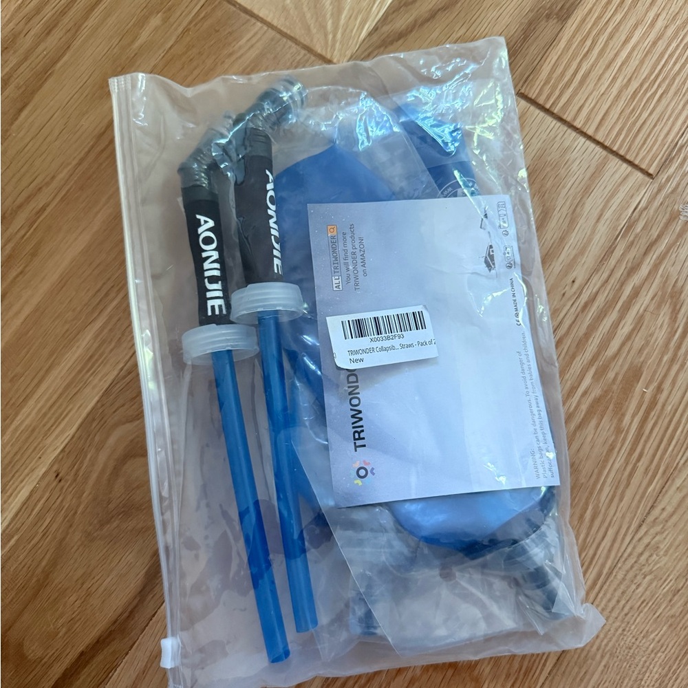 Aonijie Hydration Pack with Blue Tubes
